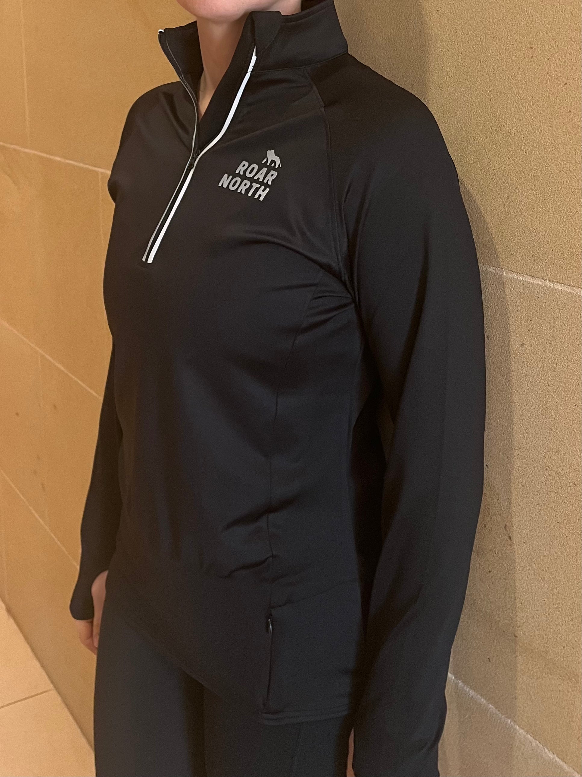 Black long sleeve half zip top