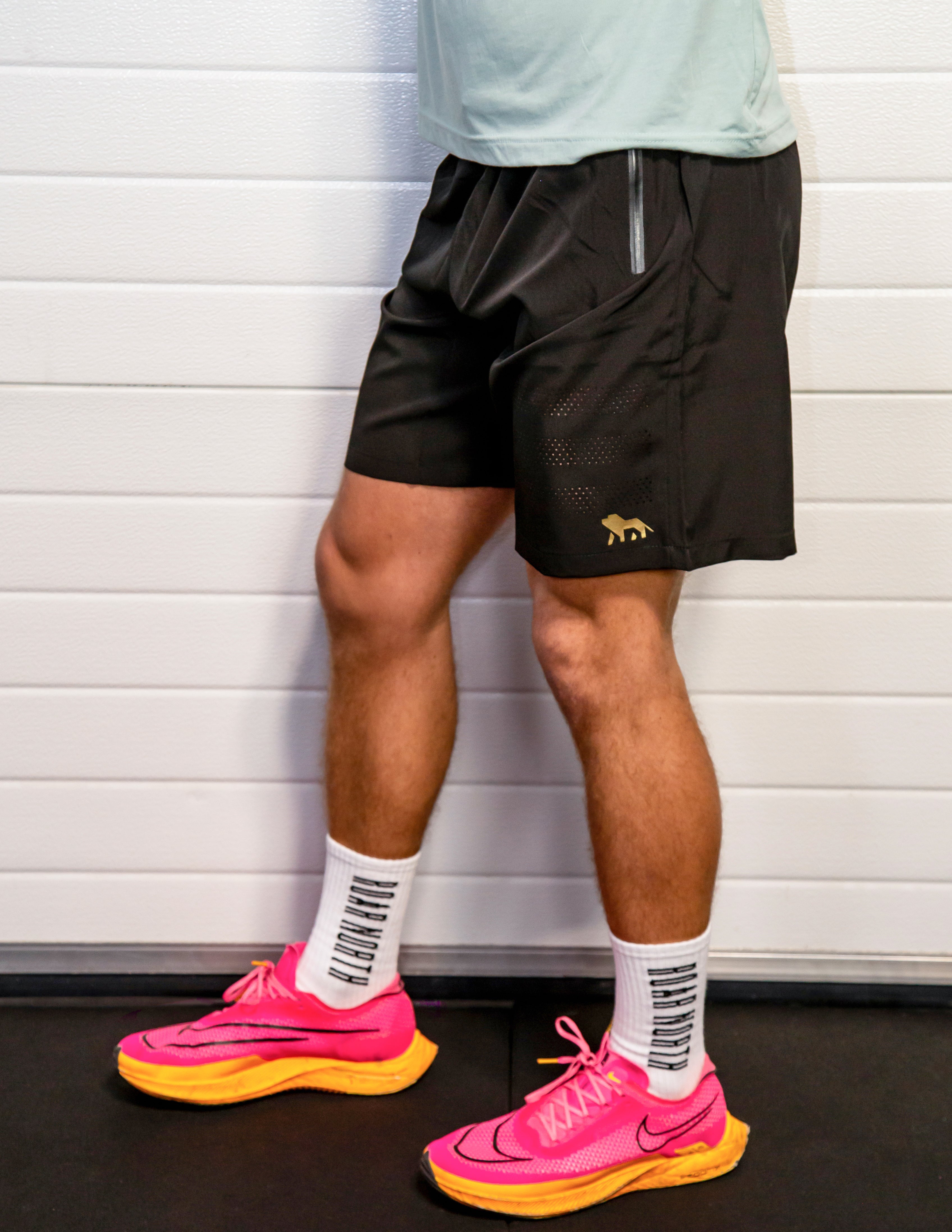 Black men’s laser cut shorts