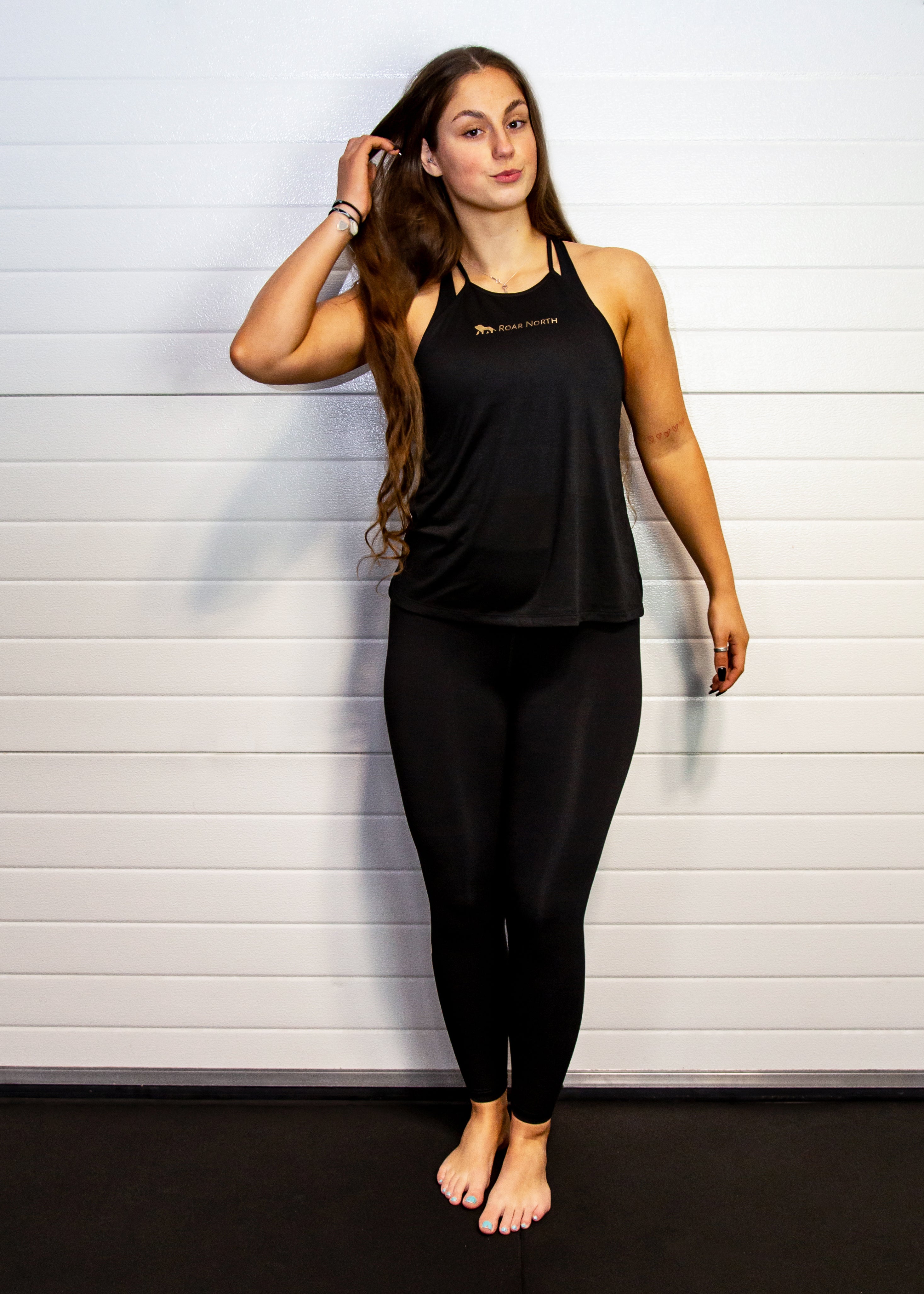 Black high neck vest